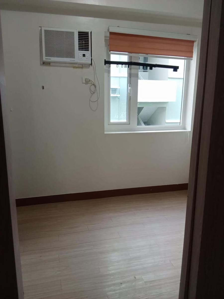 1-bedroom semi-furnished unit available for rent in Trees Residences, located in Quirino highway, Pa... - photo 1