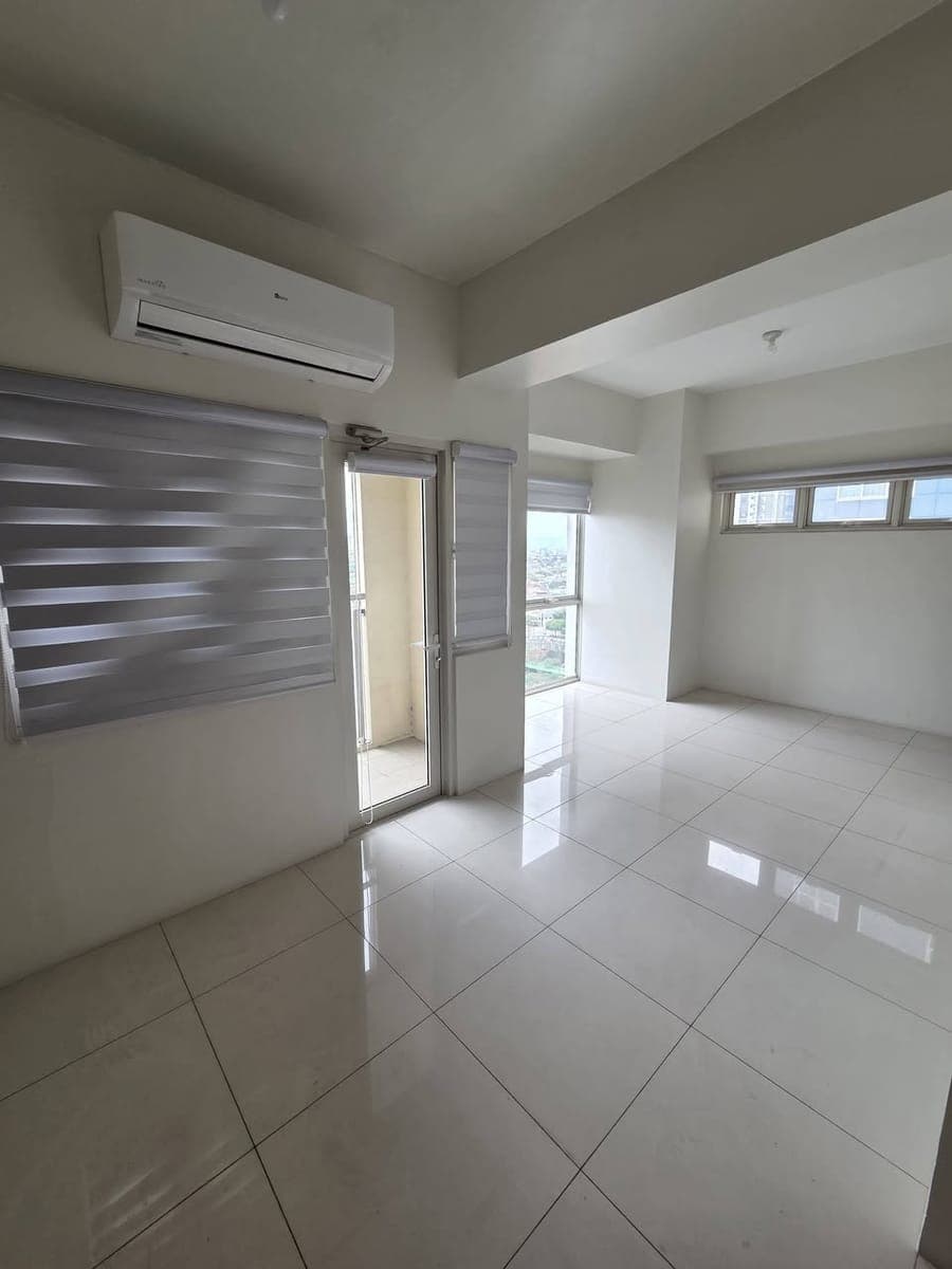FOR LEASE | 2BR with Parking | Spacious Corner Unit | ₱75,000/Month - photo 1