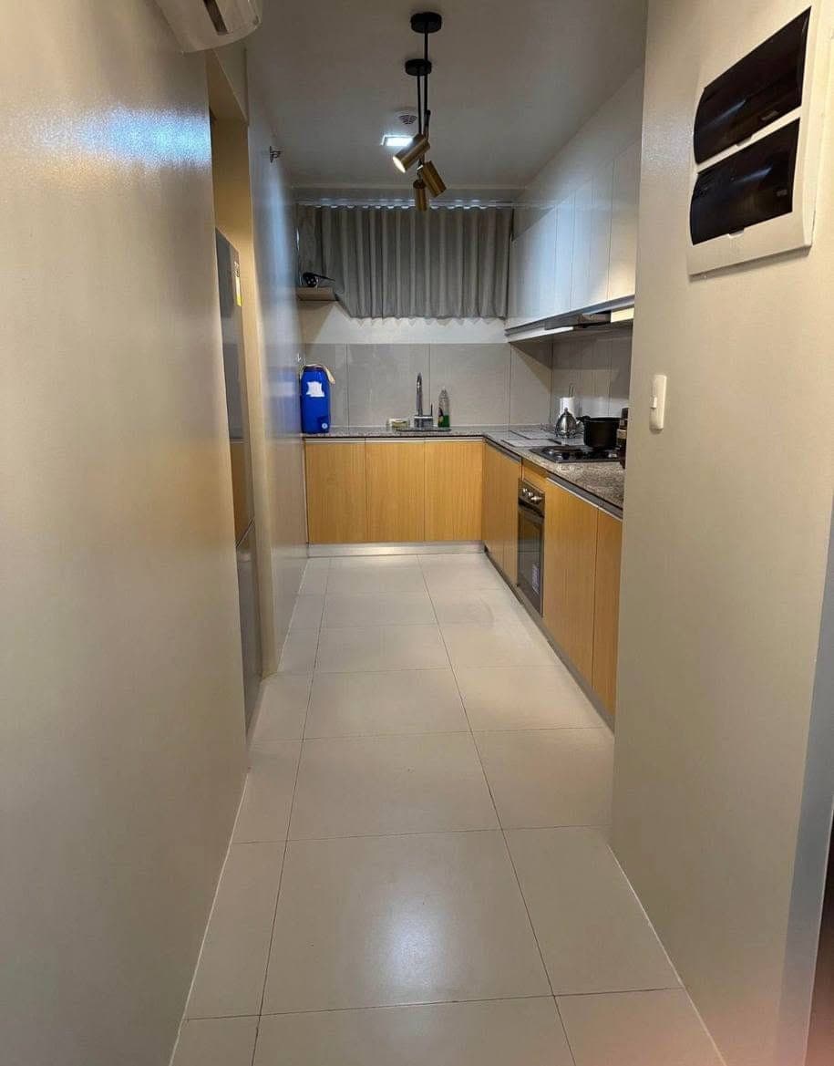FOR LEASE – Fully Furnished 2BR + Maid's Room Corner Unit - photo 5