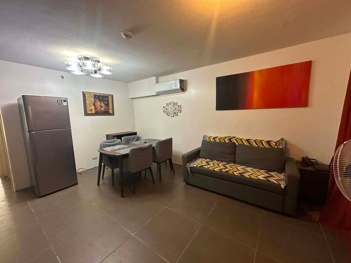 FOR RENT: 2 BEDROOM CONDO UNIT WITH PARKING SPACE - photo 2
