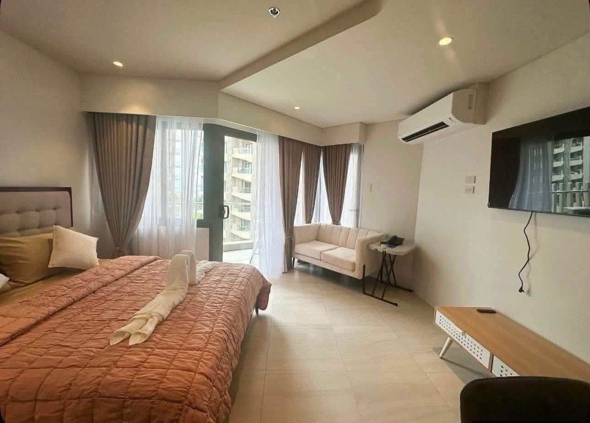 Experience the ultimate seaside lifestyle in this beautifully renovated studio at Tambuli Seaside Li... - photo 1