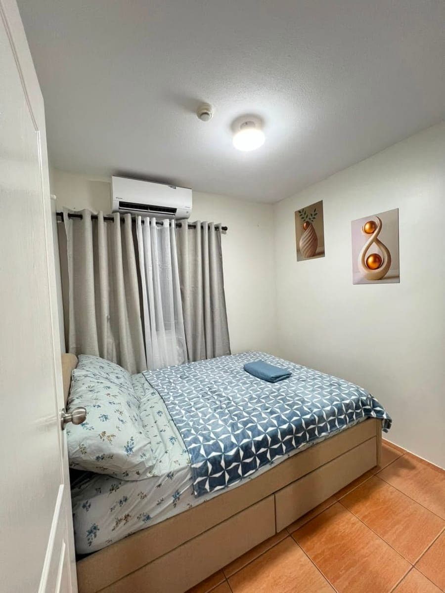 Fully furnished 2-bedroom condo at San Remo Oasis, SRP, Cebu City. Enjoy a bright open living area w... - photo 1