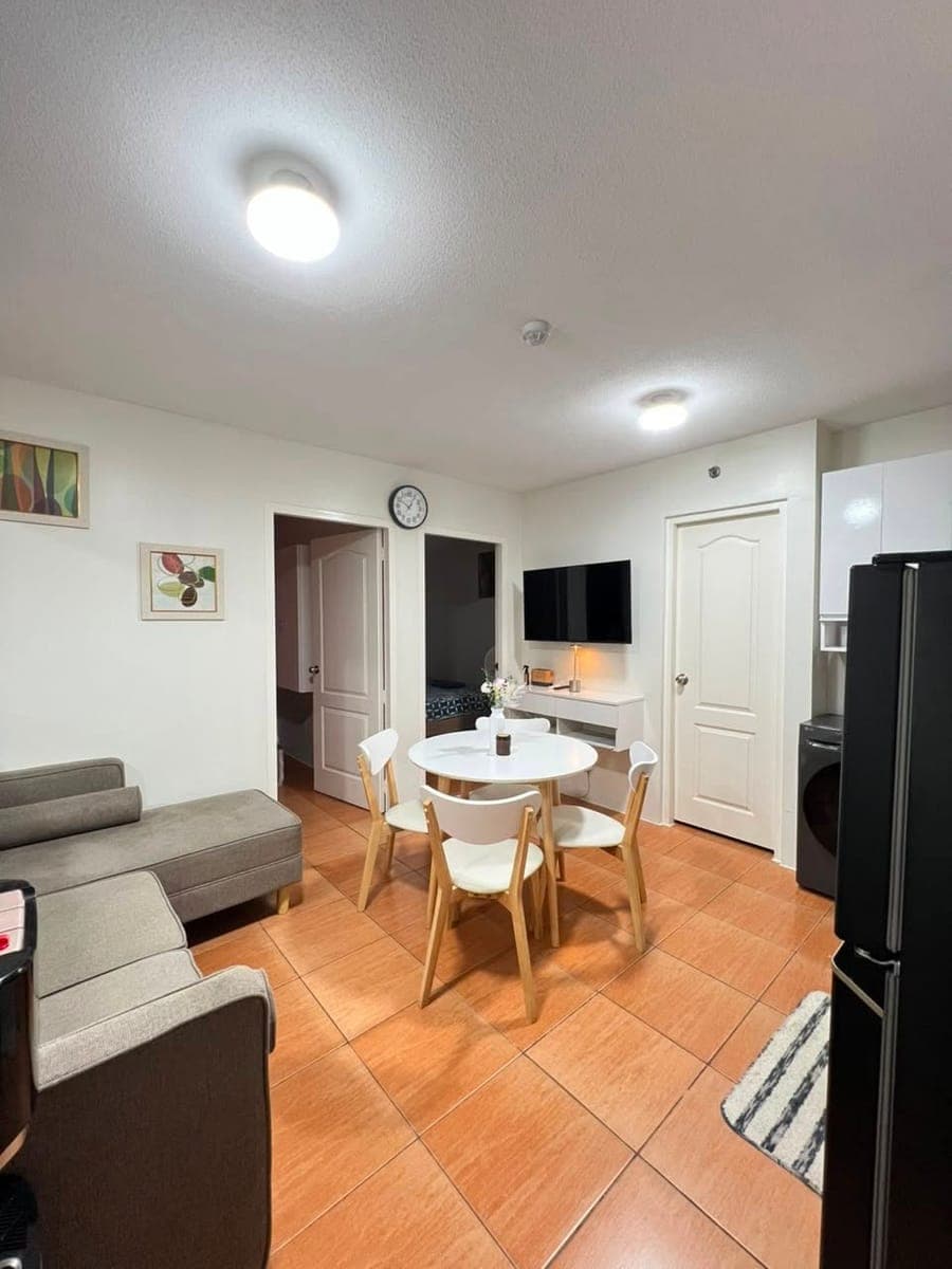 Fully furnished 2-bedroom condo at San Remo Oasis, SRP, Cebu City. Enjoy a bright open living area w... - photo 2