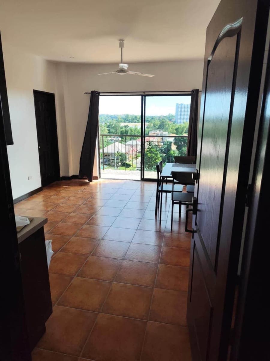 Top floor corner unit with balcony and great hills view for rent  in La Cittadella, Talamban, Cebu. - photo 2