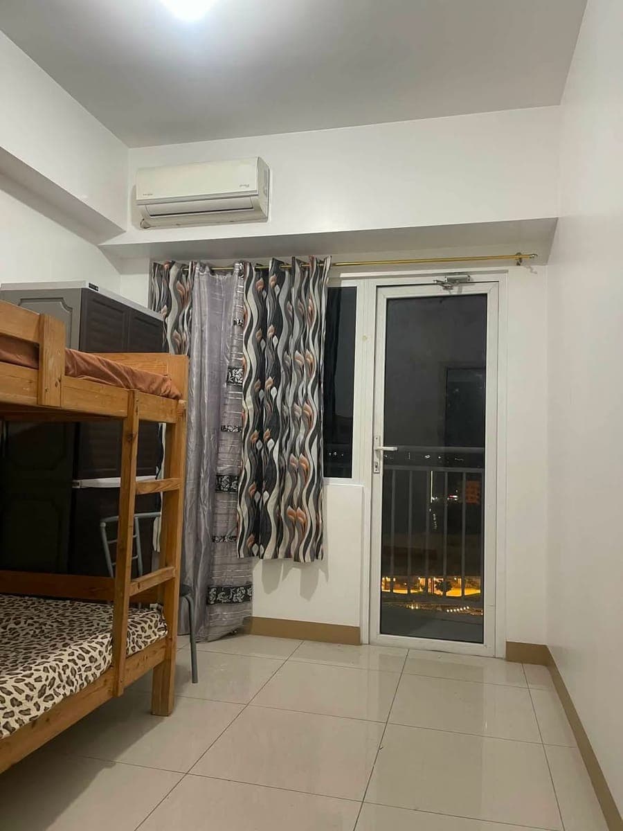 FOR RENT: Semi-Furnished 2-Bedroom Unit with Balcony at South Residences - photo 1
