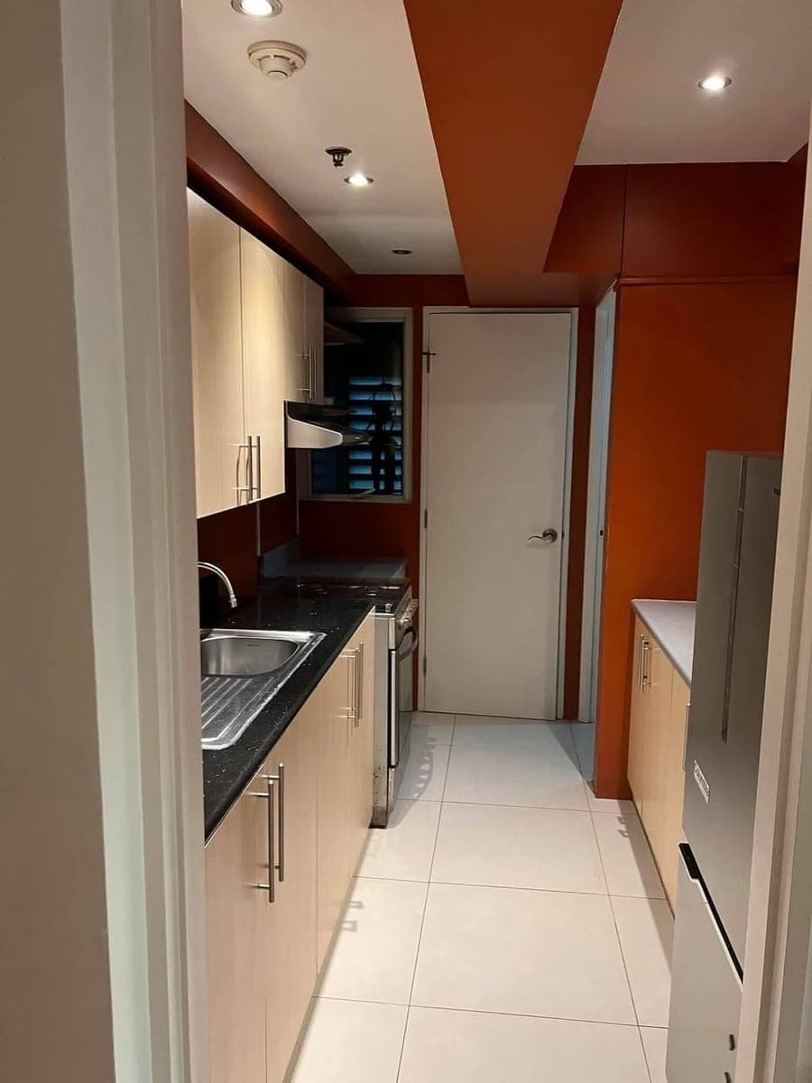 FOR RENT: 2 BEDROOM CONDOMINIUM UNIT w/ maid’s quarter - photo 1