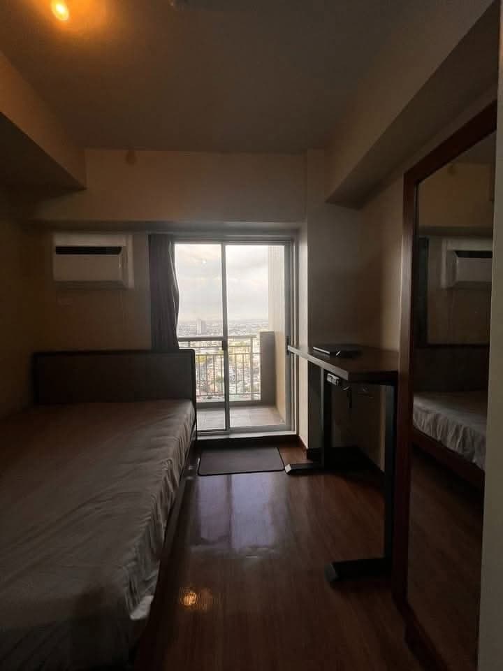 FOR RENT: Semi-Furnished 1BR unit at Cameron Residences, Quezon City - photo 1
