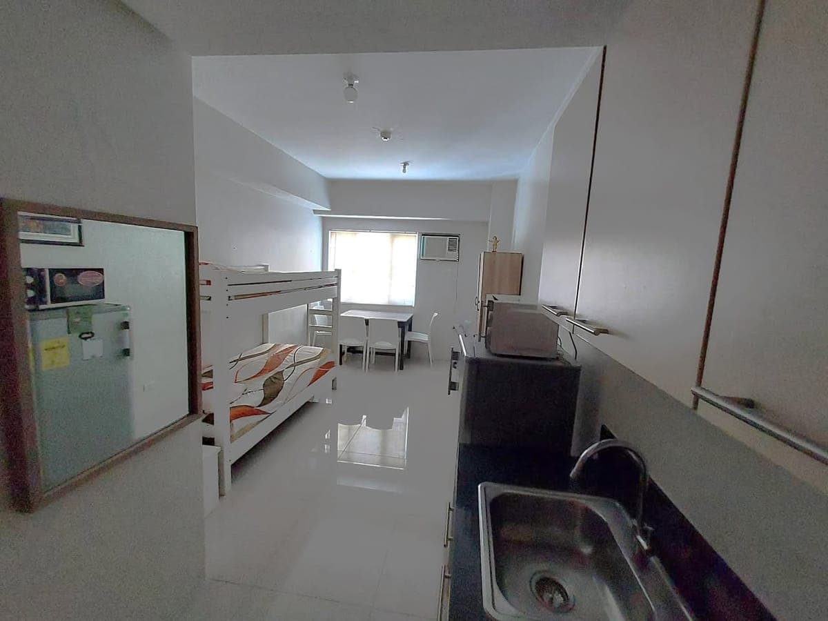 Fully Furnished Studio Condo Unit For Rent - 25th Floor at Blue Residences - photo 1