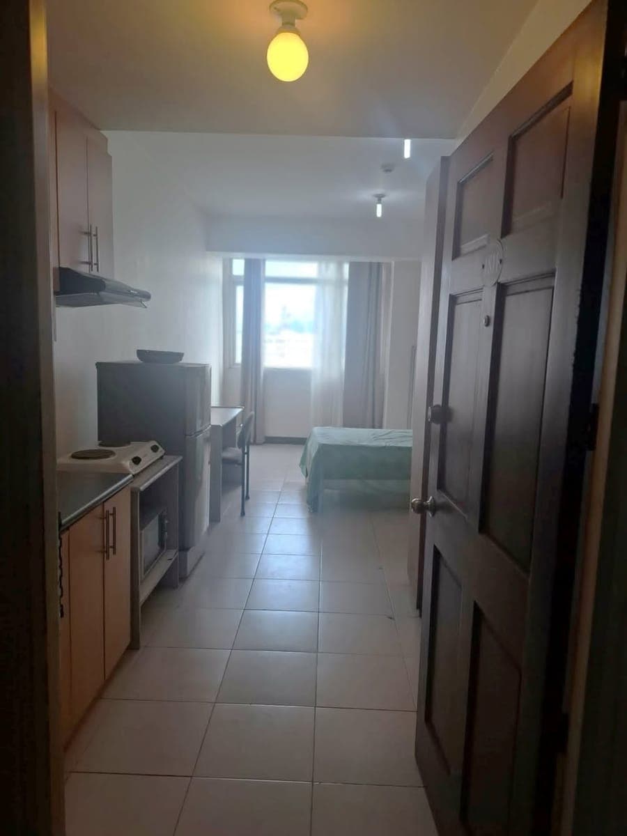 Fully Furnished Studio Condo Unit For Rent - Unit 1811 (18th Floor) at Residencia de Regina - photo 1