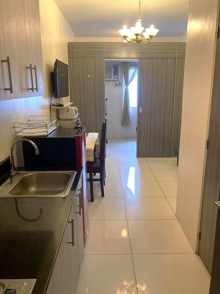 Fully Furnished 1 Bedroom Condo Unit For Rent - 48th Floor at Green Residences - photo 1