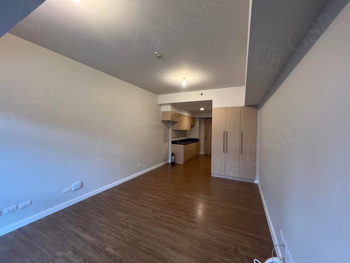 **Unfurnished Studio Unit For Lease at The Travertine at Portico ** - photo 1